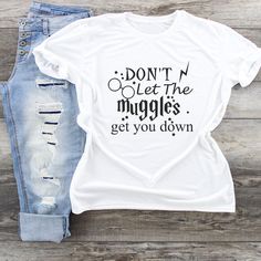 Don't Let The Muggles Get You Down Graphic T-Shirt For The Untimate Harry Potter Fan! Universal T Shirt Ideas, Harry Potter Tshirt Ideas Design, Harry Potter Shirts Vinyl, Universal Shirt Ideas, Harry Potter Shirts For Universal, Harry Potter Christmas Shirt, Funny Harry Potter Shirts, Hogwarts Shirt, Embroidered Tee Shirt