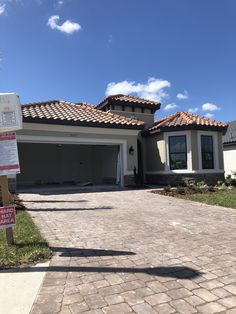 a house with a sign in front of it