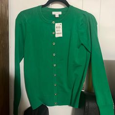 Green Cardigan Never Warm Before Perfect Condition Classic Green Sweater For Spring, Classic Green Spring Sweater, Classic Fitted Green Cardigan, Fitted Green Cardigan For Workwear, Elegant Green Spring Sweater, Elegant Fitted Green Cardigan, Green Classic Cardigan For Spring, Classic Green Cardigan For Spring, Classic Green Spring Cardigan