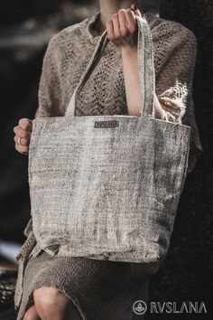 Introducing our exquisite Eco-Friendly Nettle Bag - a harmonious blend of nature-inspired design and sustainable craftsmanship. Crafted with care and consciousness, this nettle bag is a testament to both style and environmental responsibility. Dimmentions: 40 x 30 x 10 cm 🌿The material used to sew the bag is 100% hand-woven nettle. Ecological, though forgotten material used by our ancestors. Very durable, made of thick nettle yarn. 🙋 By buying this bag, you support small craft villages and give work to excluded people living in the countryside. 🌿 Natural Elegance: Embrace the raw beauty of nature with this enchanting nettle bag. Its earthy tones and organic texture evoke a sense of authenticity, making it a perfect accessory for nature enthusiasts and fashion-forward individuals alike. Eco-friendly Beige Shoulder Bag For Gift, Handmade Nature-inspired Bag For Daily Use, Nature-inspired Handmade Bags For Everyday Use, Nature-inspired Handmade Shoulder Bag For Everyday Use, Everyday Handmade Nature-inspired Shoulder Bag, Handmade Nature-inspired Everyday Shoulder Bag, Artisan Gift Bag In Natural Color, Artisan Natural Color Gift Bag, Eco-friendly Ethically Sourced Natural Bag