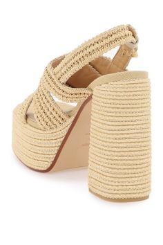 The Fulvia sandals by Castañer are made of woven raffia with criss-crossed straps, an adjustable ankle strap, leather insole and rubber sole. Raffia Sandals, Before Midnight, Woven Raffia, Beach Wear Dresses, Sandals For Sale, Flat Espadrilles, Versace Men, Pump Sandals, Women Accessories Bags