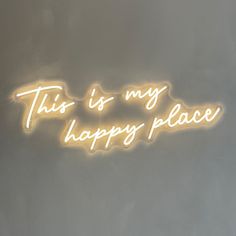 this is my happy place neon sign on the wall in front of a gray background