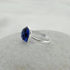 Sapphire Ring, Blue Sapphire 10x10mm Cushion Gemstone Ring, 925 Sterling Silver Ring, Blue Gemstone Ring Item Code: BTJW2063 Metal: 925 Sterling Silver Plating: Silver Stone Detail : Blue Sapphire Quartz (Lab Created), Cushion Faceted, 10mm x 10mm * Please note that there will be slight variations in stone texture and color shades in the actual product that you receive. Stone quality or grade will be same. * All our jewelry is Micron Plated which is higher quality as compared to Standard Plating Ring Blue Sapphire, Blue Gemstone Ring, Dainty Rings, Blue Gemstone Rings, Bezel Ring, Stone Texture, Ring Blue, Personalized Rings, Blue Sapphire Rings