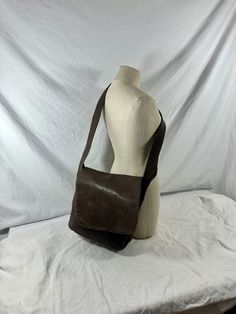 "Measurements are 10\"5 wide, 10\" high, 3\"5 deep with one 41\" shoulder strap with a 20\" drop.  This bag is awesome with one main compartment, lined in brown fabric  interior, silver tone hardware and a top zipper closure.  The leather is thick and strong with no tears and bag has some odor as is vintage. This lovely bag is spacious with plenty of room and will last you for years to come. 100% genuine leather hand made by SIMON.  I SHIP WORLDWIDE    I want to stress that item is vintage which Vintage Brown Flap Shoulder Bag, Vintage Brown Crossbody Flap Bag, Vintage Brown Flap Bag, Vintage Brown Flap Satchel, Vintage Brown Flap Bag For Travel, Vintage Brown Saddle Bag With Detachable Strap, Brown Leather-backed Crossbody Flap Bag, Brown Leather Backing Crossbody Flap Bag, Brown Leather Backed Crossbody Flap Bag