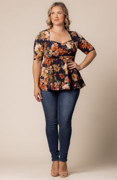 This versatile top is framed by elbow-length sleeves and features a flouncy peplum that moves when you walk. 27 1/2" (size 1X) Sweetheart neck Elbow-length sleeves 95% polyester, 5% spandex Machine wash, dry flat Made in the USA of imported fabric Fitted Floral Print Blouse With Half Sleeves, Fitted Half Sleeve Floral Print Blouse, Fitted Half Sleeve Floral Blouse, Fitted Floral Print Peplum Top, Fitted Floral Print Top With 3/4 Sleeves, Fitted Floral Print Blouse With 3/4 Sleeves, Fitted Blouse With Floral Print And 3/4 Sleeves, Peplum Top Outfits, Curvy Girl Outfits