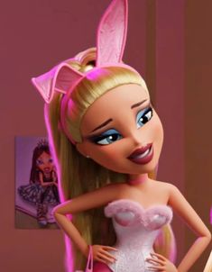 the barbie doll is dressed in pink and has bunny ears on it's head