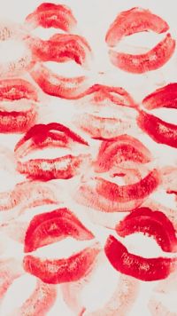 red lips are arranged in the shape of circles