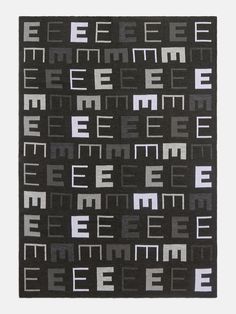 a black and white rug with the words eeeee meme in different languages