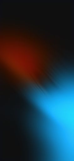 a blurry image of blue and red colors