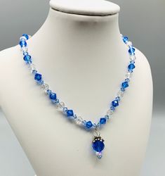 "Sapphire Blue is September Birthstone.  Swarovski Crystal with Sterling Silver clasp. 17\" as shown. Unique gift for Sept. birthday girls. Available in different lengths. Message us. Birthstones: Jan. = Garnet Feb.= Amethyst  March= Aquamarine April= Diamond/Crystal  May= Emerald  June= Pearl/light amethyst/alexandrite July= Ruby Aug.=Peridot  Sept.= Sapphire  Oct. Rose Pink/Opal Nov. = Citrine, Yellow Topaz Dec. Zircon/Turquoise  I have always loved Jewelry.  When I was a little girl I would l Blue Crystal Necklace As Gift, Blue Crystal Necklace Gift, Blue Crystal Necklaces For Gifts, Blue Crystal Necklaces As A Gift, Blue Adjustable Jewelry With Sparkling Stones, Adjustable Blue Jewelry With Sparkling Stones, Blue Crystal Jewelry With Faceted Beads, Blue Crystal Necklace With Faceted Beads, Blue Crystal Necklaces With Faceted Beads