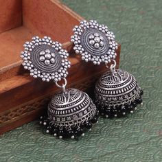 Overview These stylish Jhumka Earrings set from JewelryTrack will certainly leave you spellbound. These Jhumka Earrings set have an excellent finish and gives out an exquisite sense of style. If you are looking for an amazing Fashion Jewelry set for special occasions such as Anniversary, Engagement, Party, Wedding or for gifting , then your search ends here.  Item Description: The look is stunning and preciously suitable for all kinds of dressy occasions. COLOR : Silver  Metal: Brass With Good Quality Silver Plated For - Girls & Women OCCASION: PARTY WEAR , WEDDING, MARRIAGES, CASUAL, DAILY WEAR Ideal For Gifting Care Instruction : Avoid Heat & Chemicals Like perfume, Deo, Alchol, etc and Clean with Dry cotton. Please contact us for Bulk Orders. Seller Info: We are Aiming to supply best pr Oxidized Jhumkas, Earrings Jhumka, Oxidized Silver Earrings, Jhumki Earrings, Punjabi Suit, Earring Collection, Amazing Fashion, Fashion Jewelry Sets, Fancy Jewellery