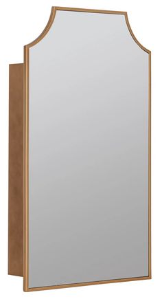 a large mirror mounted to the side of a wooden frame wall mount medicine cabinet in an oak finish