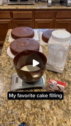 chocolate cake filling in a bowl on top of a kitchen counter