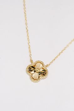 ITEM INFO Introducing our enchanting 14K Solid Gold Clover Diamond Cut Single Charm Necklace – a symbol of luck and luxury combined into a delicate 16" piece. This necklace is designed for those who seek a touch of elegance and a whisper of fortune in their daily wear. Here's why it's a treasure to behold: Symbol of Fortune: The clover charm, with its diamond-cut finish, sparkles with the promise of luck and prosperity. Luxurious Craftsmanship: Crafted from 14K solid gold, this necklace boasts a lasting shine and a premium feel. Elegant Simplicity: Its minimalist design makes it a versatile accessory, perfect for everyday elegance or as a subtle statement piece for special occasions. Comfortable Elegance: The 16" chain ensures a perfect fit, allowing the charm to rest beautifully at the co Luxury Necklace With Flower Charm For Anniversary, Luxury 14k Gold Flower Pendant Necklace, Luxury Gold Necklace With Flower Charm, Luxury Yellow Gold Necklace With Flower Charm, Luxury Tarnish Resistant Flower Pendant Necklace, Luxury Tarnish-resistant Flower Pendant Necklace, Luxury Flower Pendant Necklace With Delicate Chain, Diamond Cut Necklace, Everyday Elegance