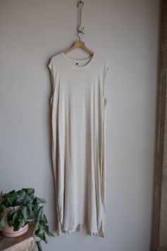 Moroccan Linen Blend Cap Sleeve Dress Size XL to XXL From the seaside town of Essaouira - a beautiful linen blend dress that is a necessary wardrobe staple that flows beautifully with your movement and a very flattering sleeve! Measurements: Shoulder:  19 inches (one side) Armpit:  27 inches (one side) Length:  53.5 inches Oversized Neutral Summer Dress, Beige Loose Fit Linen Beach Dress, Beach Beige Loose Fit Linen Dress, Oversized Beige Linen Dress For The Beach, Oversized Beige Linen Beach Dress, Linen Blend Dress, Seaside Town, Cap Sleeve Dress, The Seaside