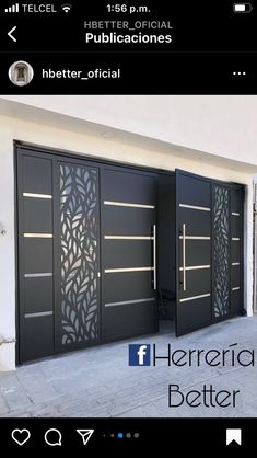 an image of two black doors with intricate designs on them and the words herer official below