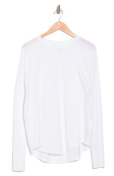 Cut from breathable cotton fabric, a long sleeve raglan top offers a relaxed silhouette for comfy styling. 25" length (size S) Crew neck Long raglan sleeves Slips on over head Curved hem Solid 100% cotton Machine wash cold Imported Model stats: 5'10" height, 32" bust, 25" waist, 36" hip. Model is wearing size S. White Long Sleeve Top With Thumbholes For Spring, White Tops With Thumbholes For Loungewear, Relaxed Fit Raglan Sleeve Tops For Layering, White Raglan Sleeve Tops For Athleisure, White Crew Neck Long Sleeve Top For Layering, White Relaxed Fit Long Sleeve Top For Layering, White Stretch Long Sleeve Top For Everyday, White Everyday Crew Neck Long Sleeve Top, Basic White Long Sleeve Crew Neck Top