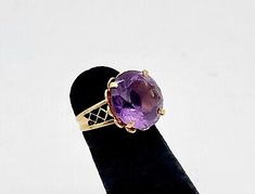 (eBay) The size is a 3 1/4 and the ring weighs 5.3 grams. Stamped 18K on the band. Luxury Victorian Amethyst Ring In Purple, Victorian Gold Amethyst Ring In 14k Gold, Luxury Victorian Amethyst Ring In Yellow Gold, Victorian Yellow Gold Amethyst Ring, Victorian 14k Gold Amethyst Ring Collectible, Princess Jewelry, Edwardian Era, Victorian Jewelry, The Band