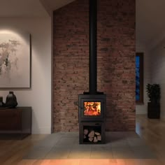 a wood burning stove sitting inside of a living room next to a painting on the wall