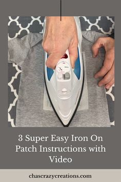 a person ironing fabric with the instructions for how to use an iron on a shirt