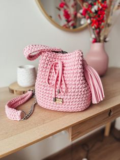 Hi! I'm MIA - unique heartmade bag! I'm created by hand for several hours. You can choose the color of the rope from which I'm made. What's more, you can choose the color of the lining and metal hardware. Only premium materials are used to make me.  I look good for casual and elegant outfits. I will catch the eye of many people. I'm truly original and well-made bags! You get in your package: Handbag, long braided/chain strap (approx 100cm), short braided strap (approx 40cm) and pendent. Premium Pink Crochet Bucket Bag With Adjustable Strap, Pink Shoulder Bucket Bag With Braided Handles, Crochet Bucket Bag For Shopping, Handmade Pink Bucket Bag, Casual Handmade Pink Bucket Bag, Trendy Crochet Bucket Bag With Braided Handles, Handmade Pink Bucket Shoulder Bag, Pink Bucket Straw Bag With Adjustable Strap, Pink Handmade Bucket Shoulder Bag