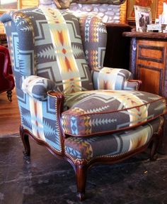 a chair that is sitting in the middle of a room