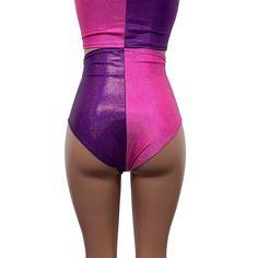 The perfect rave outfit that includes our high-waisted hot pants and crop tank in purple and pink sparkle spandex. Fitted Purple Bottoms For Club, Pink Rave Party Bottoms, Pink Rave Bottoms For Party, Pink Fitted Bottoms For Cheerleading, Fitted Pink Bottoms For Cheerleading, Stretch Purple Club Bottoms, Stretch Purple Bottoms For Club, Purple Stretch Bottoms For Club, Purple Crop Top For Club