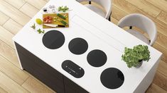 a white table with black circles on it