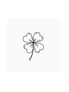 a four leaf clover drawn in black ink