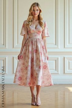 Olivia Mark - Elegant Blush Floral Midi Dress with V-neckline and Flutter Sleeves Gentle Movement, Understated Luxury, Floral Motifs, Flutter Sleeves, Floral Midi Dress, Cinched Waist, Full Skirt, Olivia Mark, Floral Motif