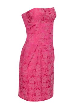 Live out your Barbie dreams in this playful pink brocade strapless corset dress by Nicole Miller. Featuring a flirty tie back and styled to perfection with a strappy heel and jeweled clutch, this mini dress is sure to make a statement wherever you go. Size 6 Made in USA 75% Acetate, 22% Polyester, 3% Lycra Fully lined Invisible side zipper Lave up back detail Strapless Bust 36" Waist 32" Length 30.5" Pink Strapless Dress For Evening, Pink Strapless Dress For Formal Occasions, Formal Pink Strapless Dress, Feminine Strapless Dress With Ruched Bodice For Evening, Elegant Pink Strapless Maxi Dress, Chic Pink Strapless Evening Dress, Chic Pink Strapless Dress For Evening, Elegant Fitted Pink Strapless Dress, Elegant Pink Strapless Formal Dress