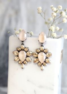 Ivory Cream Earrings, Bridal Ivory Drop Earrings, Beige Chandelier Earrings, Cream Ivory Silver Bridal Earrings, Ivory Wedding Long Earrings Cream Dangle Jewelry For Party, Cream Dangle Jewelry For Wedding, Elegant Cream Drop Bridal Earrings, Elegant Beige Wedding Jewelry, Cream Teardrop Earrings For Wedding, Cream Dangle Earrings For Wedding, Elegant Beige Earrings For Wedding, Cream Drop Earrings For Parties, Beige Drop Earrings For Party