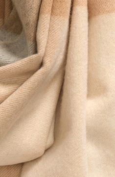 Cloud-soft cashmere offers exceptional warmth and comfort in this exquisitely crafted fringe scarf from the label's 'Soft in the Wild' collection inspired by Scottish landscapes. 100% cashmere Dry clean Made in the UK Classic Beige Shawl For Fall, Beige Pashmina Scarves For Fall, Beige Wool Shawl For Fall, Classic Beige Shawl For Winter, Beige Cashmere Shawl For Winter, Beige Cashmere Scarves For Fall, Fall Beige Wool Shawl, Luxury Beige Scarf For Fall, Fall Beige Pashmina Scarves