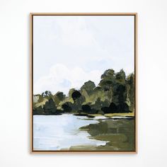 a painting hanging on the wall next to a white wall with a wooden framed frame