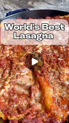 a pizza sitting on top of a pan covered in cheese and sauce with the words world's best lasagna