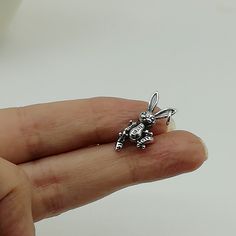 ▪︎ ONE sterling silver rabbit pendant/charm. ▪︎ This is a multi functional charm and can be used with neck chains, bracelets, key chains etc. ▪︎ Size: 21 x 10 mm ▪︎ This pendant is handmade with hypoallergenic sterling silver, and is nickel free. Comes with a 925 mark for authenticity. ▪︎ Please note: Price listed is for ONE charm. This pendant comes without the chain, however, you can add a snake neck chain, bracelet chain or hoop in the required size while making your selection. ▪︎ All jewelry Silver Bunny Design Jewelry For Gifts, Silver Bunny Design Jewelry Gift, Silver Jewelry With Bunny Design For Gift, Bunny Pendant, Egyptian Necklace, Sterling Silver Owl, Rabbit Charm, Rabbit Pendant, Tibetan Jewelry