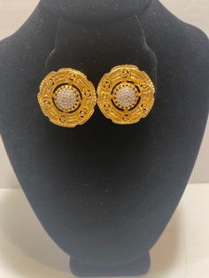 Vintage Signed Nettie Rosenstein Gold Colored with Marcasite (?) in the Middle Clip-On Earrings, 1-1/8" in diameter.  Buyer pays 6 dollars shipping and handling in US only.  Message me with questions. Silver Round Byzantine Earrings, Antique Round Earrings With Screw Back, Antique Round Clip-on Earrings For Anniversary, Gold Cluster Earrings For Formal Occasions, Antique Round Earrings For Evening, Gold Hallmarked Round Cluster Earrings, Formal Round Clip-on Earrings, Ornate Round Earrings For Anniversary, Round Costume Jewelry Earrings For Pierced Ears