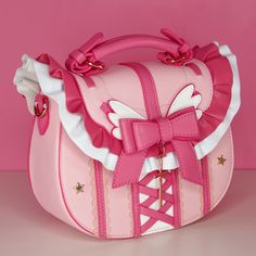 This adorable crossbody bag is versatile and matches well with many coords, including sweet lolita styles and kawaii alternative outfits. It's also wonderful to use as a cosplay accessory to rep your favourite character, or as a day to day bag. It features a classic colour palette of white, light pink & berry pink, Kawaii Bag, Kawaii Bags, Girly Bags, Kawaii Accessories, Pretty Bags, Sweet Lolita, Cute Purses, Alternative Outfits, Really Cute Outfits