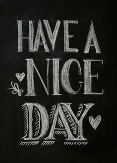 have a nice day written in chalk on a blackboard