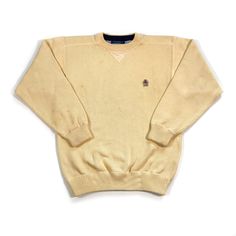 This is a vintage Tommy Hilfiger sweater, it is in good condition and labeled as a size small. Measurements available upon request. There is spotting all over as shown in photos. It is the buyers responsibility to clean the garment, sold as-is with no returns. Casual Cream Crew Neck Polo Sweater, Beige Crew Neck Polo Sweater, Vintage Crew Neck Polo Sweater For Winter, Vintage Crew Neck Polo Sweater, Vintage Cotton Polo Sweater With Crew Neck, Vintage Cotton Crew Neck Polo Sweater, Vintage Yellow Long Sleeve Sweatshirt, Vintage Beige Cotton Sweater, Yellow Vintage Long Sleeve Sweatshirt