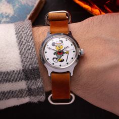 Rare model of vintage "Wostok" watch with Mickey Mouse on the dial  The watch has original box and documents. The watch was released in 1980s. The dial of the watch shows famous character from the "Mickey Mouse" cartoon. A real find for those who collects items with cartoon characters! In the 1970s, the cartoon culture was gaining momentum in the USSR, cartoon characters such as Mickey Mouse were increasingly popular in the USSR. These cartoon characters won the hearts of not only children, but Retro Automatic Collectible Watches, Retro Watch Accessories With Subdials, Retro Analog-style Collectible Watch Accessories, Mickey Mouse Retro, Watch Gift Box, Mouse Cartoon, Mickey Mouse Cartoon, Retro Watches, Watch Gifts