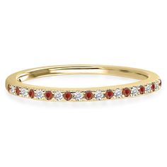 a yellow gold band with red and white stones