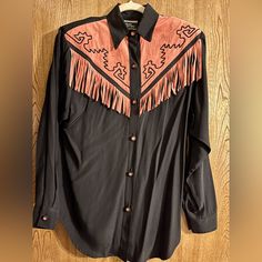 This Cute Western Style Women’s Button Down Top Is New With Tags. It’s Black With Brown Fringe And Black Embroidery. It’s An Original Design By Karen Mccarty. Paid $100. Great Condition And Comes From A Smoke And Pet Free Home. Black Western Top With Button Closure, Western Black Button-up Shirt, Brown Western Top With Buttons, Western Brown Tops With Buttons, Western Style Black Button-up Shirt, Brown Western Style Top With Buttons, Western Style Brown Tops With Buttons, Black Western Button-up Shirt, Black Long Sleeve Top For Rodeo