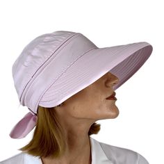 Very cute Lightweight Caps that zip off to become visor, Ponytail opening on back, Wired front for shape and packability. Superior lightweight ladies sunhat/visor all in one One size fits all Easy velcro closure to enable size adjustment featuring a beautiful bow at the back Two in one sun hat The stylish wide brimmed breathable hat is lightweight for comfort on hot days The Cotton/Polyester mixture features 30% SPF allowing reliable skin protection for ears and the entire face The hole in the b Pink Baseball Cap Sun Hat With Uv Protection, Pink Baseball Cap With Uv Protection, Casual Wide Brim Visor For Travel, Summer Baseball Cap With Uv Protection And Adjustable Fit, Adjustable Summer Baseball Cap With Uv Protection, Adjustable Fit Baseball Cap With Uv Protection For Summer, Lightweight Visor Sun Hat For Spring, Wide Brim Upf 50+ Visor For Travel, Wide Brim Visor For Travel In Spring