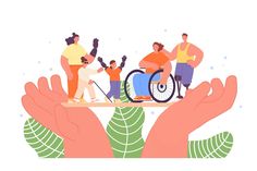 people in wheelchairs are holding out their hands