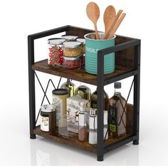 a shelf with spices and utensils on it