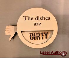 a sign that says the dishes are dirty