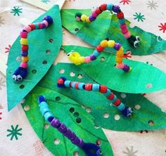 some very pretty leaf shaped crafts with beads on them