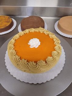 a cake sitting on top of a metal counter