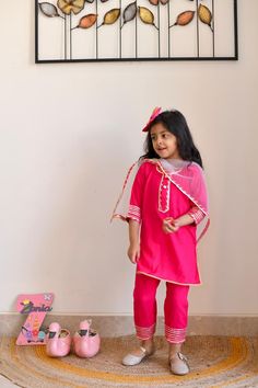 This pink kurta pyjama has been a dream come true for all the mums out there who have been wanting to get their babies dressed in ethnic yet comfortable wear.  Kurta pyjama only, no dupatta. Fabric- cotton Colour - Pink Sizes - 6months to 5years Approx measurements in inches- Photo attached. Care Guide - Dry clean only Disclaimer - pl check measurements before ordering as exchange and refunds based on measurements is not possible. Colours can vary due to screen settings. Model photography is don Long Sleeve Pink Kurta With Gota Work, Pink Gota Work Sets For Diwali, Pink Pant Set For Festive Occasion, Pink Sets With Gota Work For Navratri, Pink Gota Work Sets For Navratri, Pink Festive Pant Set, Pink Long Sleeve Festive Pant Set, Festive Pink Long Sleeve Pant Set, Festive Long Sleeve Pink Pant Set